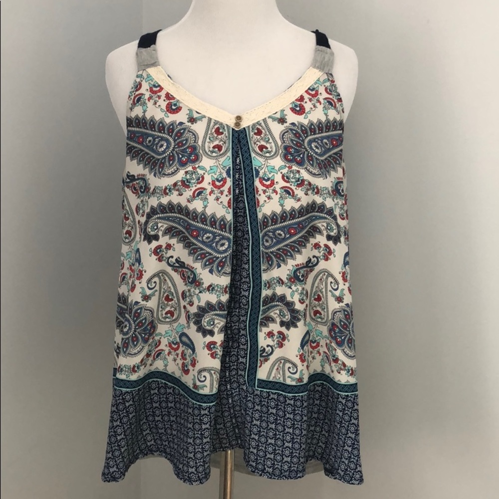 Sleeveless top by exhilaration